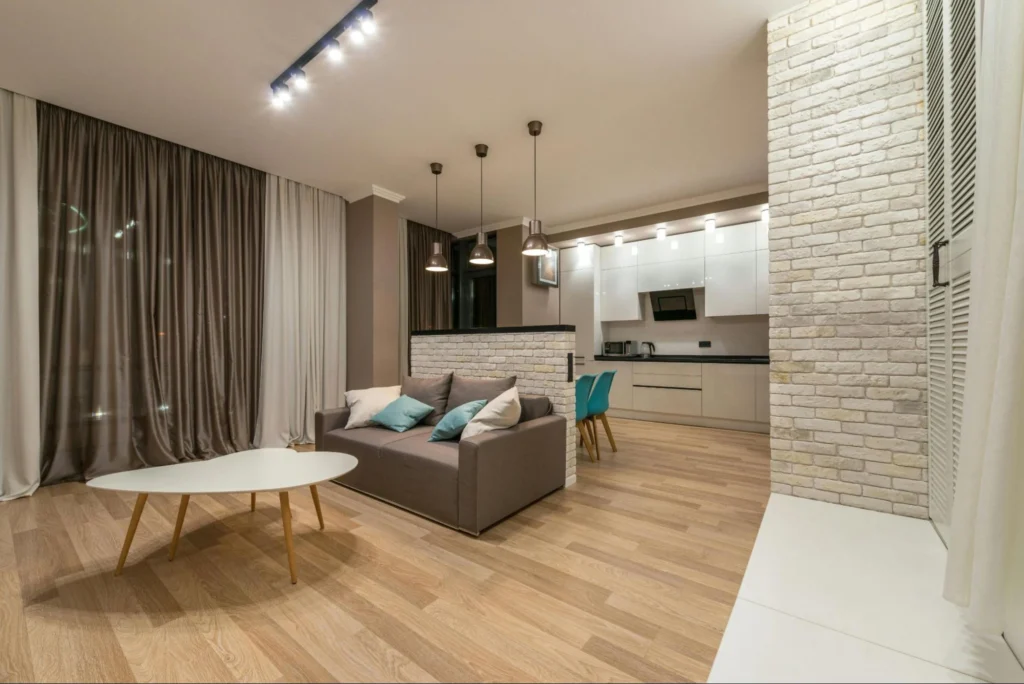 do you floor under kitchen cabinets
